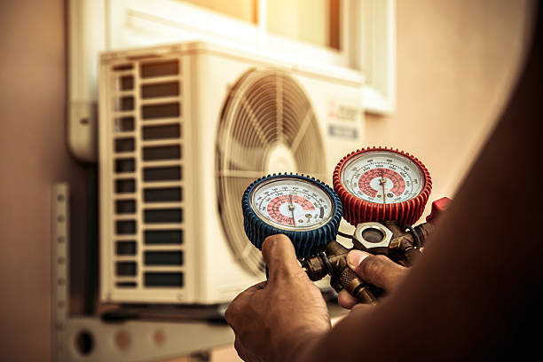 Professional Heat Pump Repair technician working in Dearborn, MI
